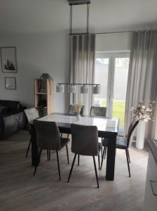 Et opholdsområde på Ferienhaus Luna am schönen Harkebrügger See mit Kamin und Sauna + 12 billeder