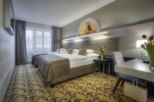 Hotel Essence客房内的一张或多张床位