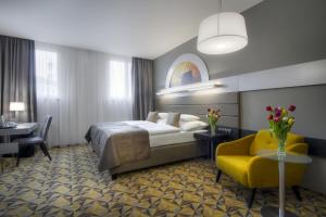 Hotel Essence客房内的一张或多张床位