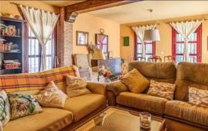 Część wypoczynkowa w obiekcie Casa situada en un entorno natural Casa Rural La Serena