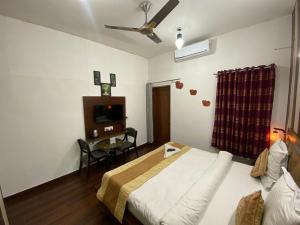 Postel nebo postele na pokoji v ubytování Golden Homestay