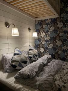 Säng eller sängar i ett rum på Sillvik C&J Hugosson