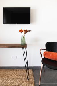 TV a/nebo společenská místnost v ubytování RITA apartments