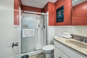 a bathroom with a shower and a toilet and a sink at Charming Cave City Vacation Rental with Fire Pit! in Cave City +22 photos