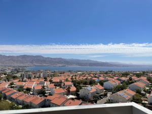 an aerial view of a city with houses and water at view point relax in Eilat