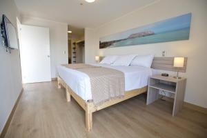 Cama o camas de una habitación en Urbano Apartments Miraflores Pardo