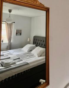 Postel nebo postele na pokoji v ubytování Killegården på Kivik