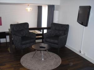 Area soggiorno di First Hotel Witt