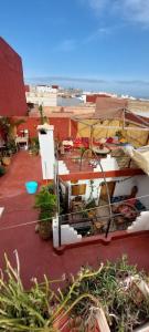 a view of a building with plants on a roof at SALAS waveclimbing company in Sidi Ifni