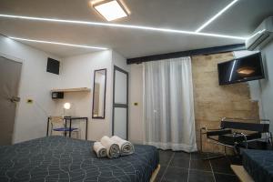 Posteľ alebo postele v izbe v ubytovaní Casa Lerux