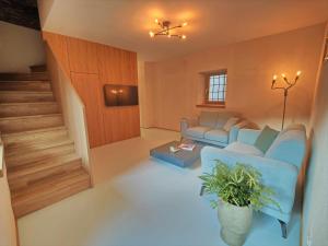 Khu vực ghế ngồi tại Rustico Mulino1 - Fully Renovated Near Locarno and Ascona