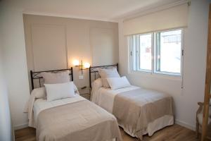 Katil atau katil-katil dalam bilik di Pension Casa Manolo