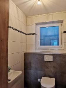 Koupelna v ubytování Berg:Zeit_Apartments