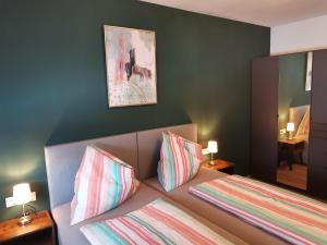 Postel nebo postele na pokoji v ubytování Berg:Zeit_Apartments