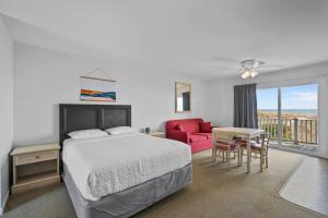 Ένα ή περισσότερα κρεβάτια σε δωμάτιο στο The Beach House +112 φωτογραφίες