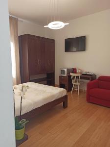 Кровать или кровати в номере B&B Suite and Rooms San Giovanni