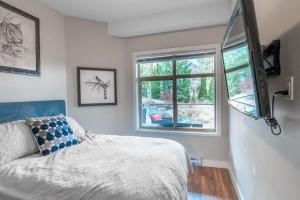 Postel nebo postele na pokoji v ubytování Fabulous Condo at Five Star Resort 209 + 32 fotografií