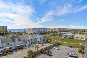 an aerial view of a city with a parking lot at Chic Fort Walton Condo about 2 Blocks to Beach! in Fort Walton Beach
