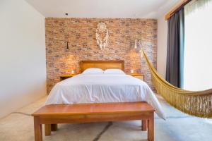 Ένα ή περισσότερα κρεβάτια σε δωμάτιο στο Jaakbal Tulum +54 φωτογραφίες