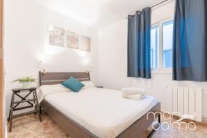 Posteľ alebo postele v izbe v ubytovaní Casa Bernat by MarCalma
