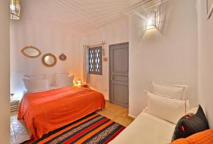 Postel nebo postele na pokoji v ubytování Riad Amya & Spa