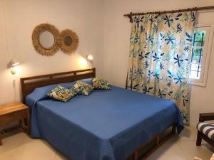 Cama ou camas em um quarto em Trou d’Eau Douce - Campement pieds dans l’eau