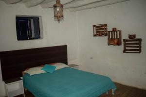 Ein Bett oder Betten in einem Zimmer der Unterkunft Intro Hostels Cusco