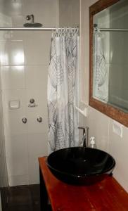 Ein Badezimmer in der Unterkunft Intro Hostels Cusco
