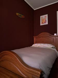 A bed or beds in a room at Madera de Olmo