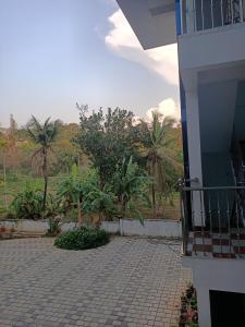 Zahrada ubytování Bethel Service Villa, Mananthavady, Wayanad