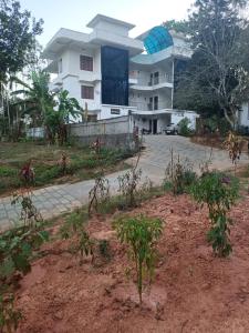 Zahrada ubytování Bethel Service Villa, Mananthavady, Wayanad