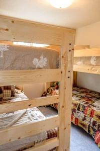 Ένα ή περισσότερα κρεβάτια σε δωμάτιο στο Klondike House