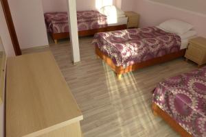 Ένα ή περισσότερα κρεβάτια σε δωμάτιο στο Apartamenty Żabcia