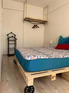 a bedroom with a bed on a wooden frame at İstanbul Kadiköy Harbour-, Cozy place, Feel@Home in Istanbul