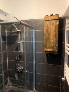 a bathroom with a shower with a wooden box at İstanbul Kadiköy Harbour-, Cozy place, Feel@Home in Istanbul