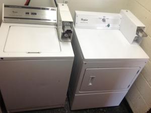 two refrigerators sitting next to each other in a room at Americas Best Value Inn Salisbury in Salisbury