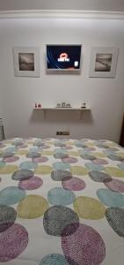Ein Bett oder Betten in einem Zimmer der Unterkunft Vivienda vacacional