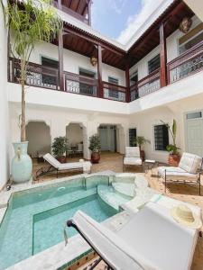 The swimming pool at or close to Riad Vivre - Design Boutique Riad in Marrakech
