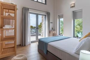 Un pat sau paturi într-o cameră la Villa Santa Anna