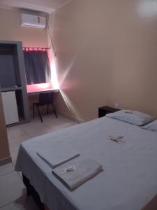 Postel nebo postele na pokoji v ubytování Hotel Val-de-Cans Aeroporto