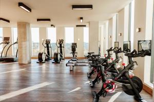 a gym with a bunch of exercise bikes in it at Austin Proper Hotel, a Member of Design Hotels in Austin