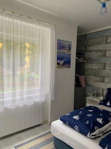 Posteľ alebo postele v izbe v ubytovaní City Center Apartman 2. Nagykanizsa