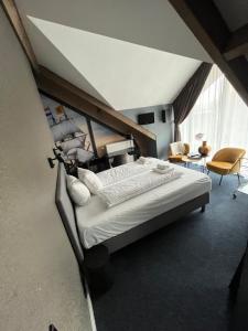 Postel nebo postele na pokoji v ubytování Hotel Oostereiland