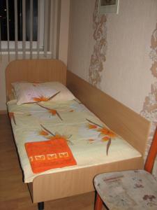 a bedroom with a bed with birds on it at Zajazd Markowski in Bojanowo