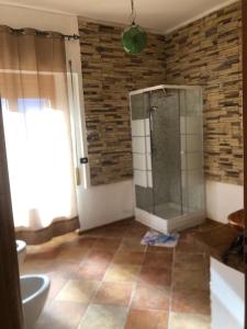 Koupelna v ubytování Casa Alighieri + 6 fotografií