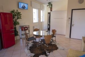 TV a/nebo společenská místnost v ubytování Terrazza Paradisus + 19 fotografií