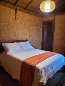 Ένα ή περισσότερα κρεβάτια σε δωμάτιο στο Casa Charmosa