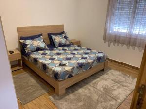 Кровать или кровати в номере Superbe appartement avec parking