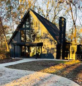 a house with a large window on the side of it at A Cozy Retreat in Gainesville