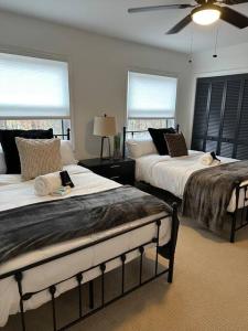 Giường trong phòng chung tại A Cozy Retreat